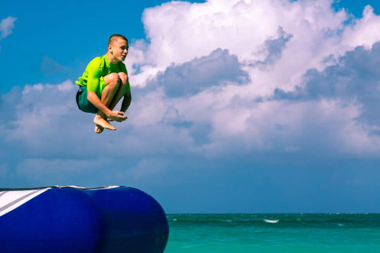 Reach New Heights With the Best Water Trampolines and Bouncers