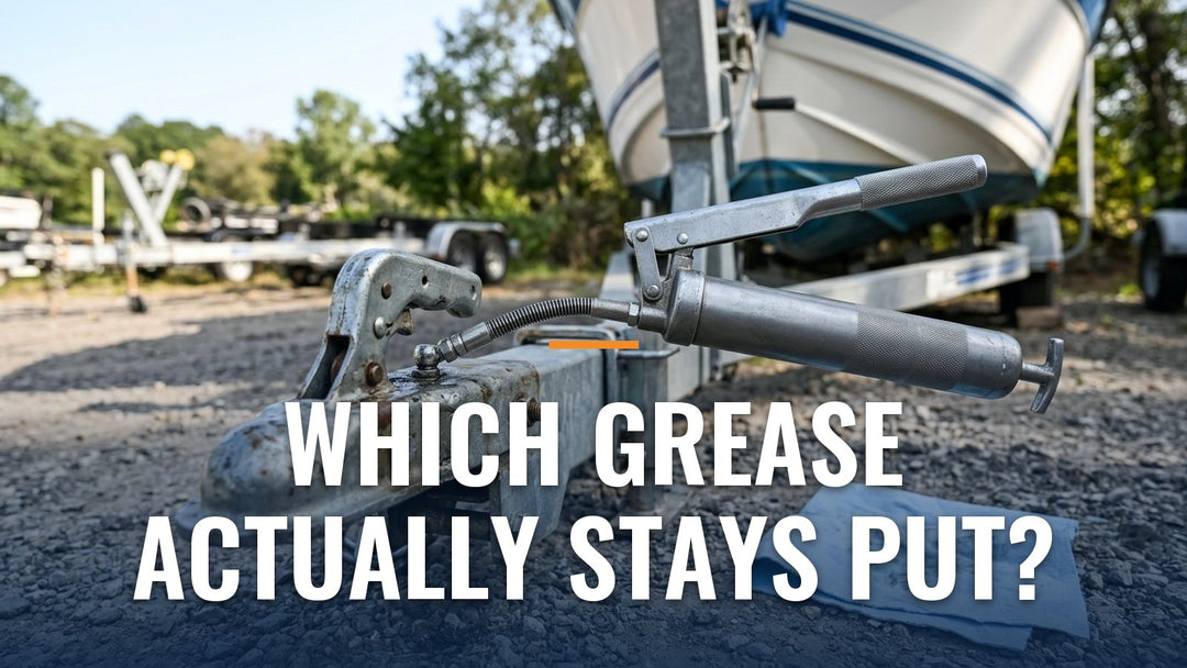 Grease gun attached to a boat trailer coupler fitting, with the words "Which Grease Actually Stays Put?"